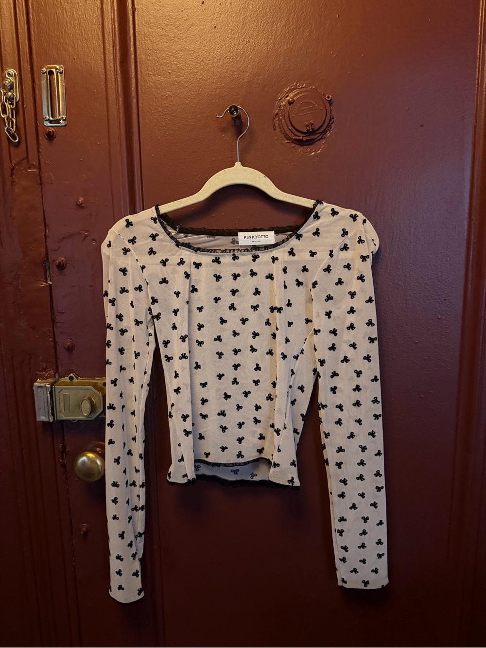 Pinkyotto White Long-Sleeve Top with Black Clover Print